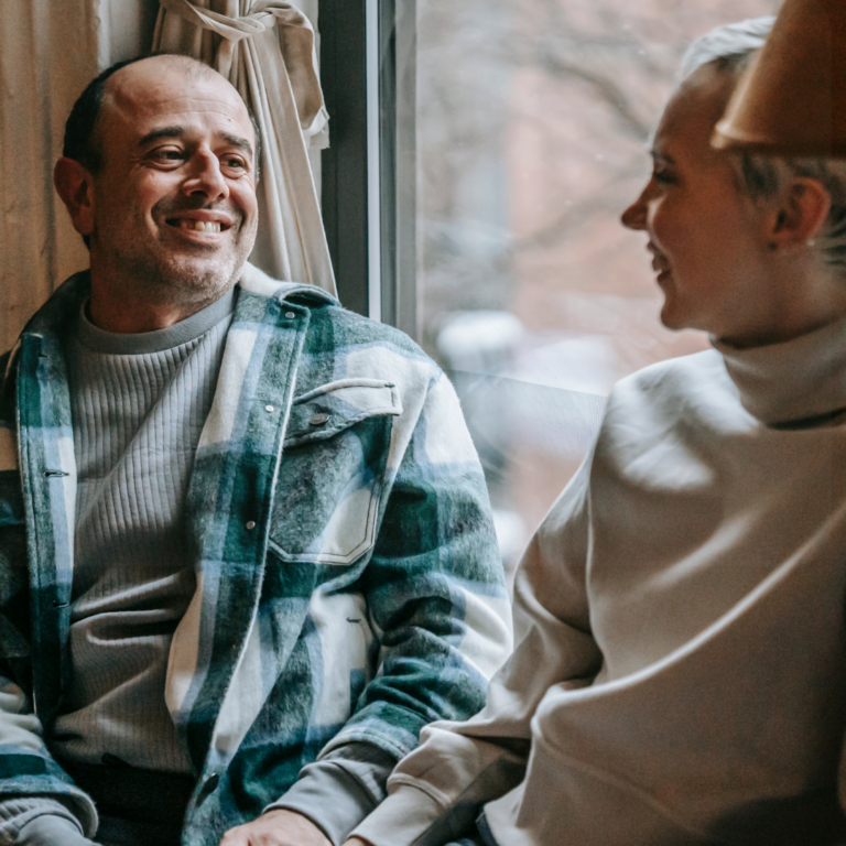 Man and woman having a supportive conversation